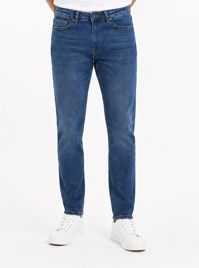 White Label Trent Tpaered Fit Stretch Jean - Mid Blue